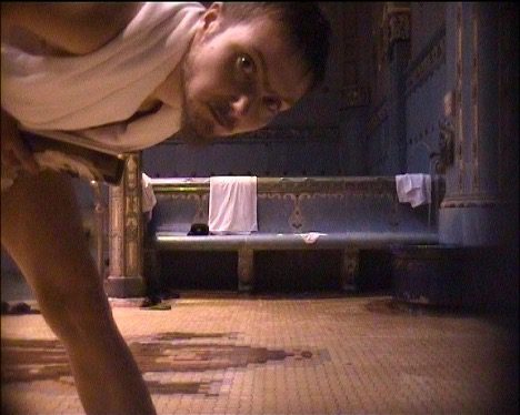 Men’s Bathhouse, 1999. Artist in disguise. [Video still]. Photo by Katarzyna Kozyra. Courtesy Katarzyna Kozyra Foundation.